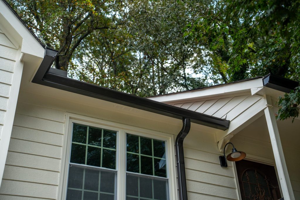 Black gutter above a window