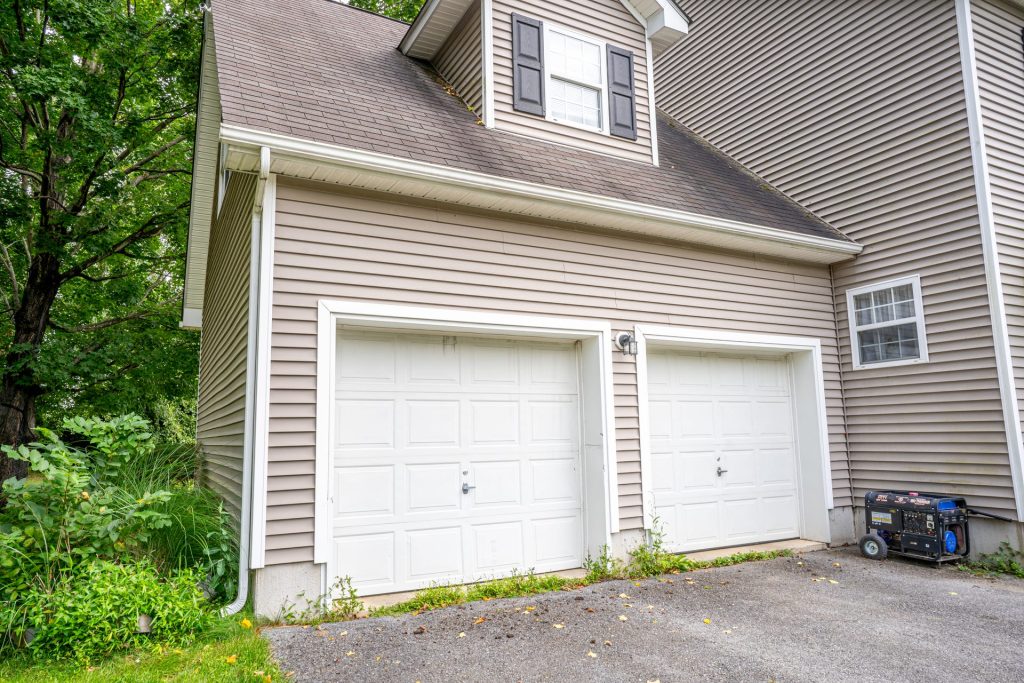 Gutters and downspout over a two-car garage